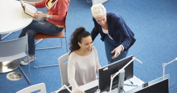 University students working in library
